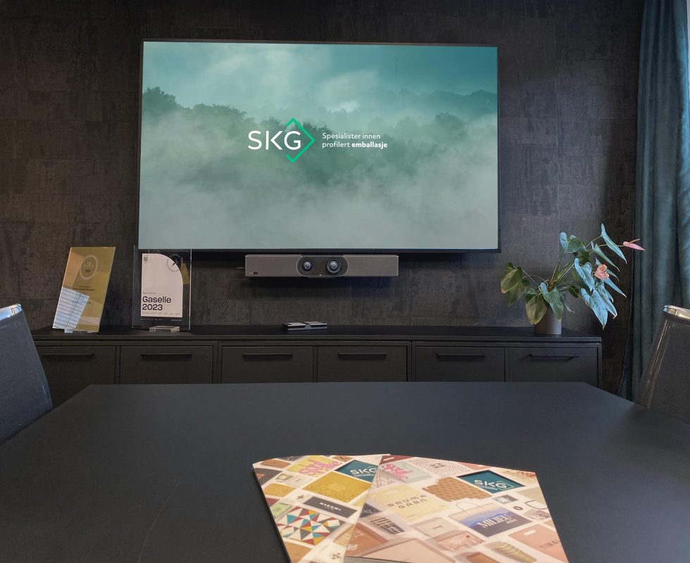 SKG Emballasje design av skjerm på møterom